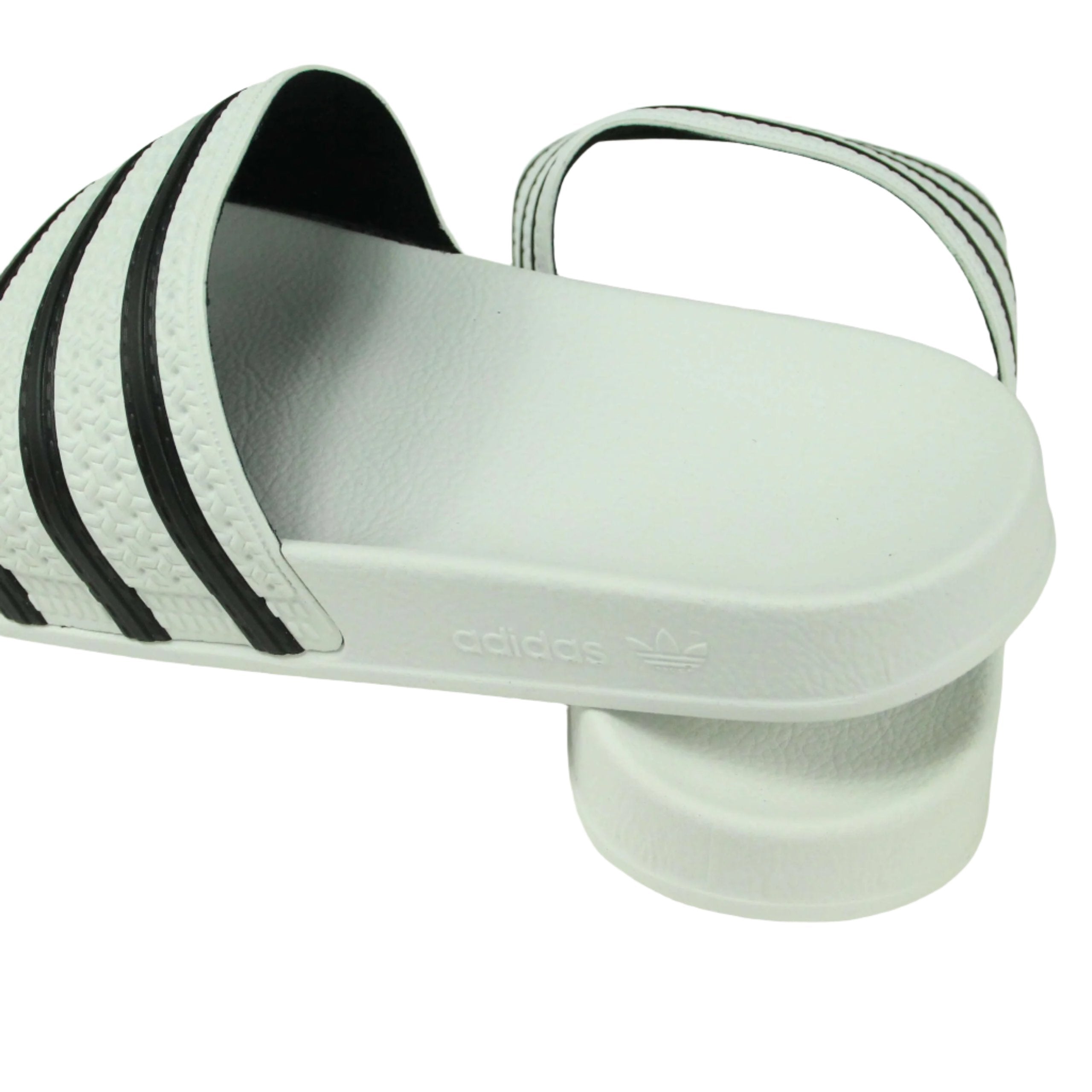 white adidas sliders